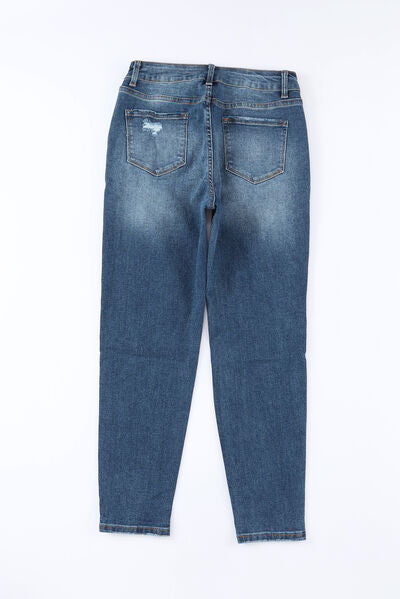 Button-Fly Distressed skinny Jeans